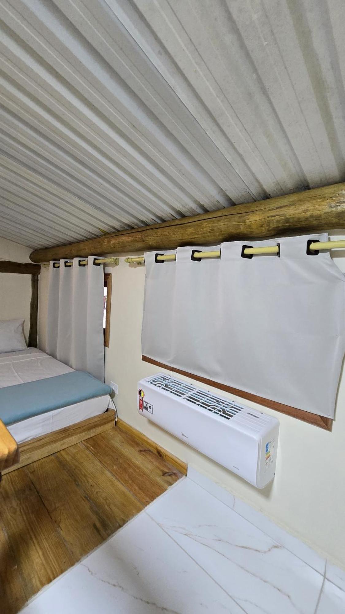 Pousada Dona Carmem Ubatuba Quarto foto
